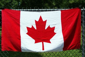 Canadian flag beach towel 30x60-inches TWXCA on fence