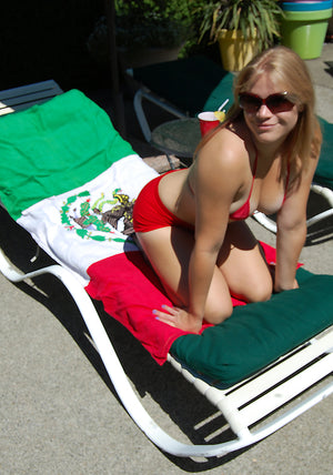 using her Mexican flag beach towel 084 to get a tan